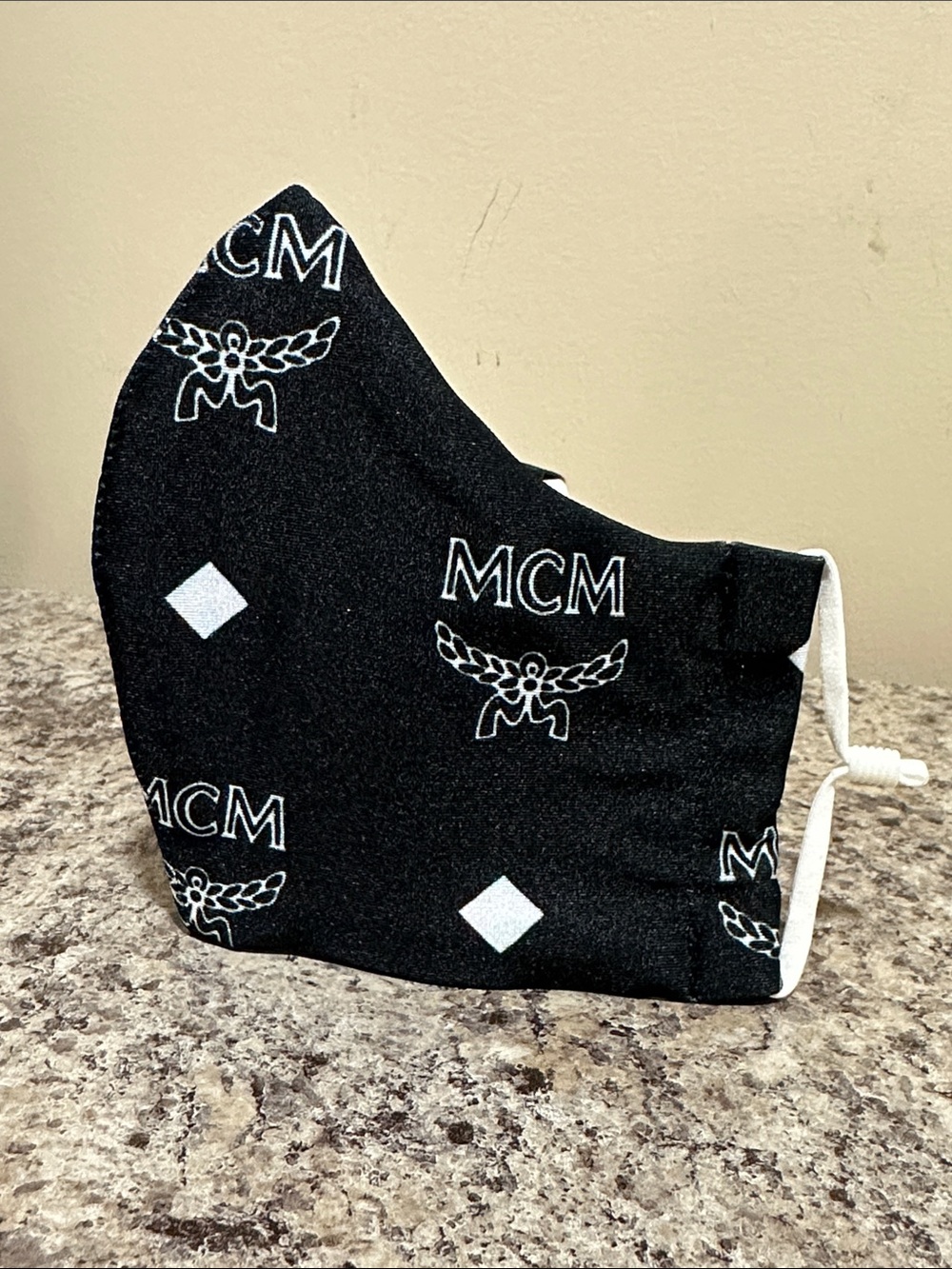 M C M Printed Face Mask